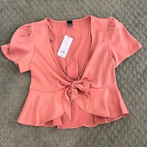Pink blouse from target new with tags.